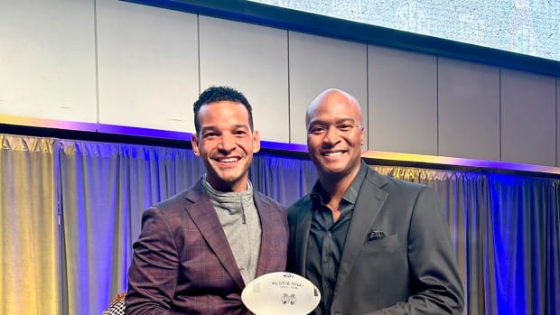 Mississippi State athletic director Zac Selmon with tight end Reggie Kelly (1995-98) when he was named a 2023 SEC Legend.